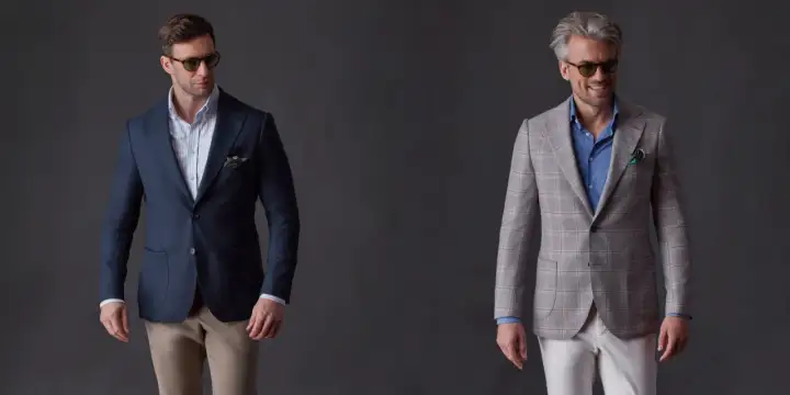 Eleganckie stylizacje dla mężczyzn: jak ubrać się na chrzciny jako gość. Granatowa marynarka z beżowymi spodniami lub szara w kratę z białymi.